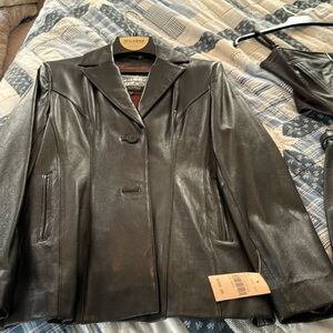 This is a 3 piece black leather outfit